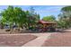 Relaxing gazebo in a manicured community park surrounded by desert landscaping at 745 N Royal Crest Cir # 157, Las Vegas, NV 89169
