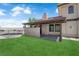 A beautiful exterior with a private patio, green grass, and carport at 781 Bourbon St # 1, Pahrump, NV 89048
