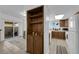 Kitchen with built-in shelves and backyard access at 781 Bourbon St # 1, Pahrump, NV 89048
