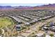 Desirable community with lush green spaces, mountain views, and homes with private pools and solar panels at 786 Etter Creek St, Las Vegas, NV 89138