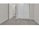 Carpeted bedroom showing closet and open doorway at 786 Etter Creek St, Las Vegas, NV 89138