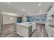 Beautiful kitchen featuring an island with a sink and new stainless steel appliances at 786 Etter Creek St, Las Vegas, NV 89138