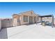 View of backyard area features a covered patio with outdoor furniture at 820 Peach Ave, North Las Vegas, NV 89032