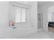 Elegant bathroom featuring a large soaking tub, a separate shower, and natural light at 820 Peach Ave, North Las Vegas, NV 89032