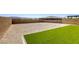Low maintenance backyard with artificial turf at 832 Gallery Course Dr, Las Vegas, NV 89148