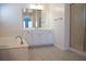 Bathroom featuring dual sinks and separate shower and tub at 832 Gallery Course Dr, Las Vegas, NV 89148
