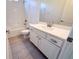 Bathroom featuring tiled floor, vanity with sink, toilet and shower-tub combo at 832 Gallery Course Dr, Las Vegas, NV 89148