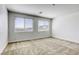 Comfortable bedroom with plush carpeting and bright windows offers a cozy retreat at 832 Gallery Course Dr, Las Vegas, NV 89148