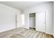 Clean bedroom with carpet, closet with sliding doors, and natural light at 832 Gallery Course Dr, Las Vegas, NV 89148