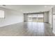 Bright living room with tile flooring and sliding glass doors to backyard offers natural light at 832 Gallery Course Dr, Las Vegas, NV 89148