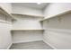 Spacious walk-in closet with multiple shelves and rod hanging space at 832 Gallery Course Dr, Las Vegas, NV 89148
