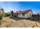 Spacious backyard featuring a covered patio, providing an ideal space for outdoor relaxation and entertaining at 8517 Soneto Ln, Las Vegas, NV 89117