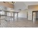 Spacious living room with modern floors and an open floorplan at 8517 Soneto Ln, Las Vegas, NV 89117