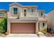 Charming two-story home featuring an attached two-car garage and second-story balcony at 9130 Beauchamp Ave, Las Vegas, NV 89148