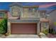 Charming two-story home featuring an attached two-car garage and second-story balcony at 9130 Beauchamp Ave, Las Vegas, NV 89148