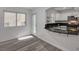 Modern kitchen featuring granite countertops, stainless steel appliances, and stylish white cabinetry at 9130 Beauchamp Ave, Las Vegas, NV 89148
