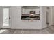 Modern kitchen featuring granite countertops, stainless steel appliances, and stylish white cabinetry at 9130 Beauchamp Ave, Las Vegas, NV 89148