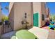 Enclosed patio area features outdoor seating, a picnic table and recreational play equipment at 9130 Beauchamp Ave, Las Vegas, NV 89148