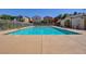 Sparkling community pool with ample deck space for lounging at 9130 Beauchamp Ave, Las Vegas, NV 89148