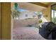 Covered patio with brick flooring, perfect for outdoor dining and relaxation at 9256 Blue Flax Pl, Las Vegas, NV 89148