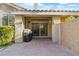 Covered brick patio with a grill, ideal for hosting outdoor gatherings and barbecues at 9256 Blue Flax Pl, Las Vegas, NV 89148