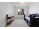 Bright bedroom with a view of the exterior landscape from the bedroom window at 9256 Blue Flax Pl, Las Vegas, NV 89148