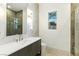 Well-lit bathroom featuring modern fixtures and decor at 9408 Players Canyon Ct, Las Vegas, NV 89144