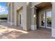 Luxury home featuring covered patio for outdoor living, offering seamless indoor-outdoor flow at 9408 Players Canyon Ct, Las Vegas, NV 89144