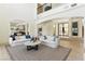Bright living room with a high ceiling and open floor plan at 9408 Players Canyon Ct, Las Vegas, NV 89144
