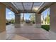 Outdoor kitchen featuring a stainless steel grill and stone surround at 9408 Players Canyon Ct, Las Vegas, NV 89144