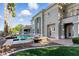 Luxury home showcasing a refreshing pool, spa and a spacious patio with multiple seating areas at 9408 Players Canyon Ct, Las Vegas, NV 89144