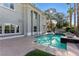 View of the refreshing pool and well-maintained backyard of this stunning property at 9408 Players Canyon Ct, Las Vegas, NV 89144