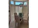 Cozy breakfast nook with bright windows, creating a perfect spot for morning coffee and meals at 10036 Keysborough Dr, Las Vegas, NV 89134