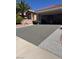 Long driveway leading to a two-car garage, providing ample parking space for residents and guests at 10036 Keysborough Dr, Las Vegas, NV 89134