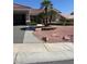 Charming single-story home with a well-manicured front yard and inviting curb appeal at 10036 Keysborough Dr, Las Vegas, NV 89134