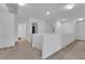 Second-floor hallway showing access to bedrooms and recreation room, natural lighting at 10045 Natchez Trace St, Las Vegas, NV 89178