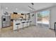 Bright and airy eat-in kitchen with stainless steel appliances and ample counter space at 10045 Natchez Trace St, Las Vegas, NV 89178