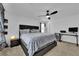 Cozy bedroom with a large bed, soft lighting, and comfortable decor at 10045 Natchez Trace St, Las Vegas, NV 89178