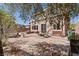 Spacious backyard with patio furniture, decorative paver stones and minimal landscaping at 10478 Beallsville St, Las Vegas, NV 89141