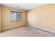 Neutral bedroom with carpet, blinds over window for privacy and light control at 10478 Beallsville St, Las Vegas, NV 89141