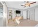 Comfortable bedroom featuring wood flooring, ample natural light, and lots of closet space at 105 Shadow Ln, Las Vegas, NV 89106