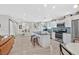 Modern kitchen with stainless steel appliances, center island with seating, and stylish backsplash at 105 Shadow Ln, Las Vegas, NV 89106