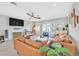 A spacious living room featuring hardwood flooring, fireplace, and recessed lighting at 105 Shadow Ln, Las Vegas, NV 89106