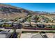 A masterfully planned desert community with a lovely mountain backdrop offers amazing scenery at 10693 Harvest Green Way, Las Vegas, NV 89135