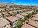 Well-maintained neighborhood featuring tile roofs, mature trees, and desirable two-story homes nestled in the desert at 11901 Luna Del Mar Ln, Las Vegas, NV 89138