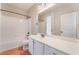 Clean bathroom with white cabinets, shower-tub combo, and tile floors at 11901 Luna Del Mar Ln, Las Vegas, NV 89138