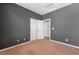 Bedroom with carpet and a closet at 11901 Luna Del Mar Ln, Las Vegas, NV 89138