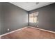 Bedroom with a window and carpet at 11901 Luna Del Mar Ln, Las Vegas, NV 89138