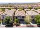Charming two-story home with manicured landscaping and a welcoming entrance, showcasing curb appeal at 11901 Luna Del Mar Ln, Las Vegas, NV 89138