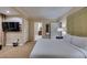Comfortable bedroom with ensuite bathroom and TV, perfect for relaxation at 135 E Harmon Ave # 2821, Las Vegas, NV 89109